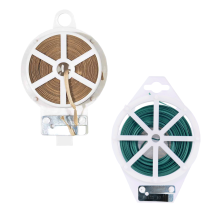 Ties dispenser with built in cutter blade